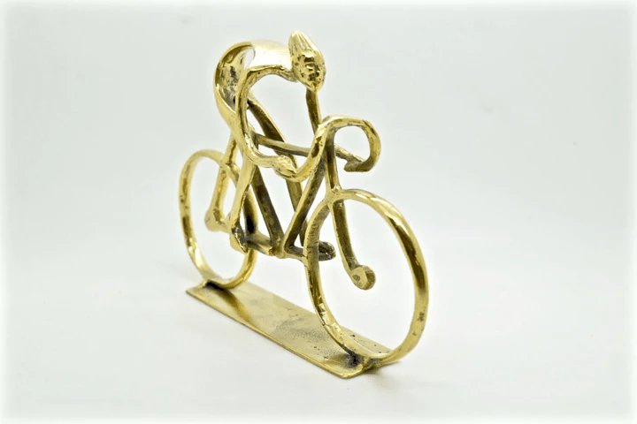 SOLID BRASS CYCLING SCULPTURE